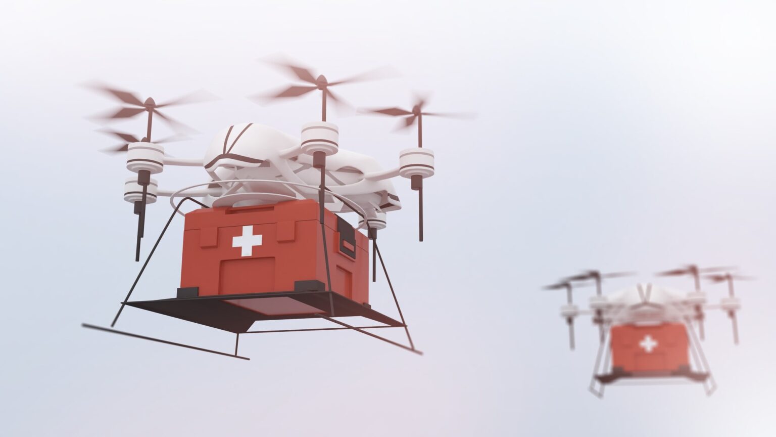 Two low-altitude drones are transporting medical supply boxes with white crosses, likely for emergency healthcare delivery in 2025.